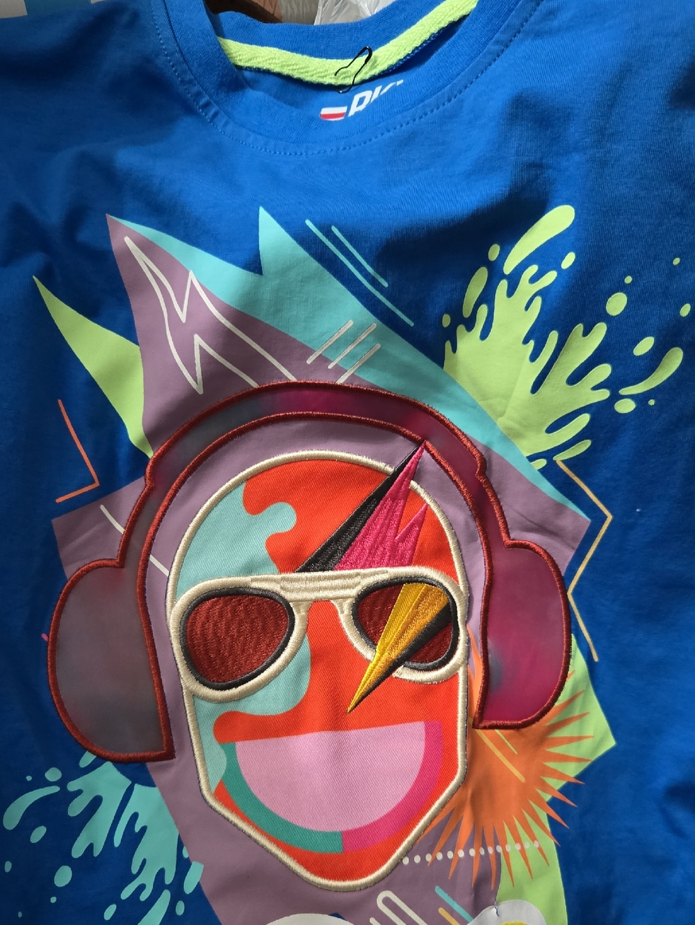 Unbranded Men’s Blue Graphic Tee with Colorful Headphone Print